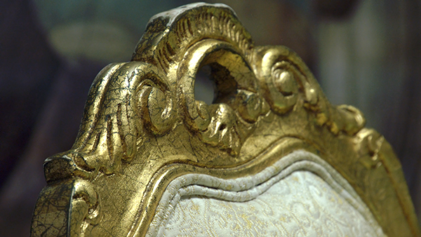 Closeup of gilded chair